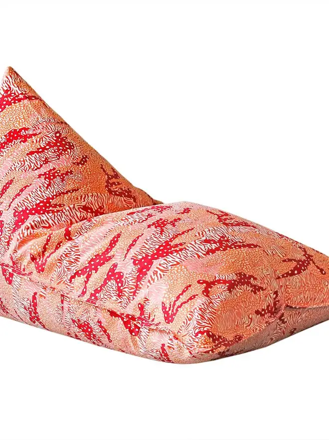 orange Big Cat Camo Bean Bag Cover, an orange bean bag cover sitting against a white backdrop.