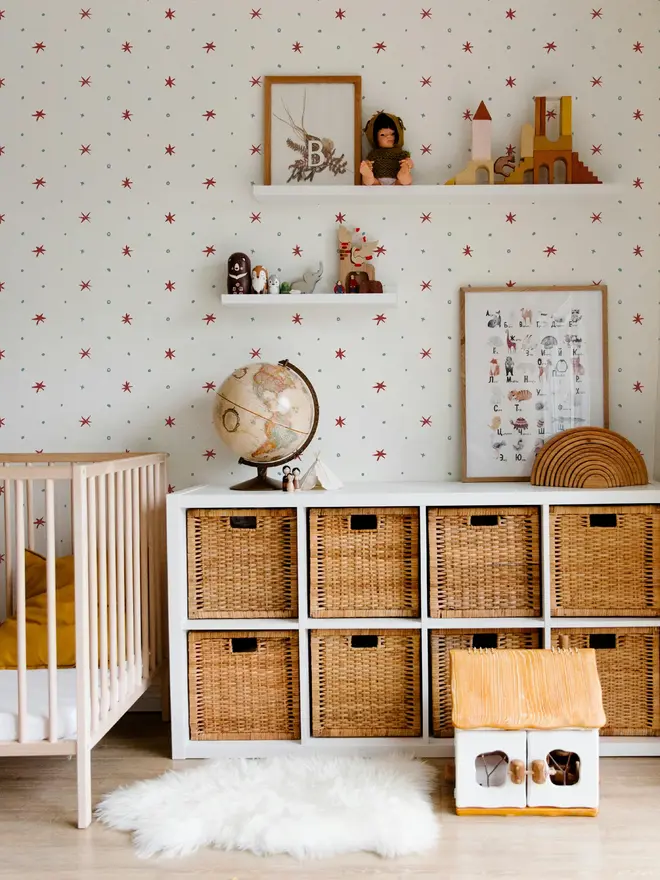 Ensueño Wallpaper, a living room with a colourful wallpaper. 