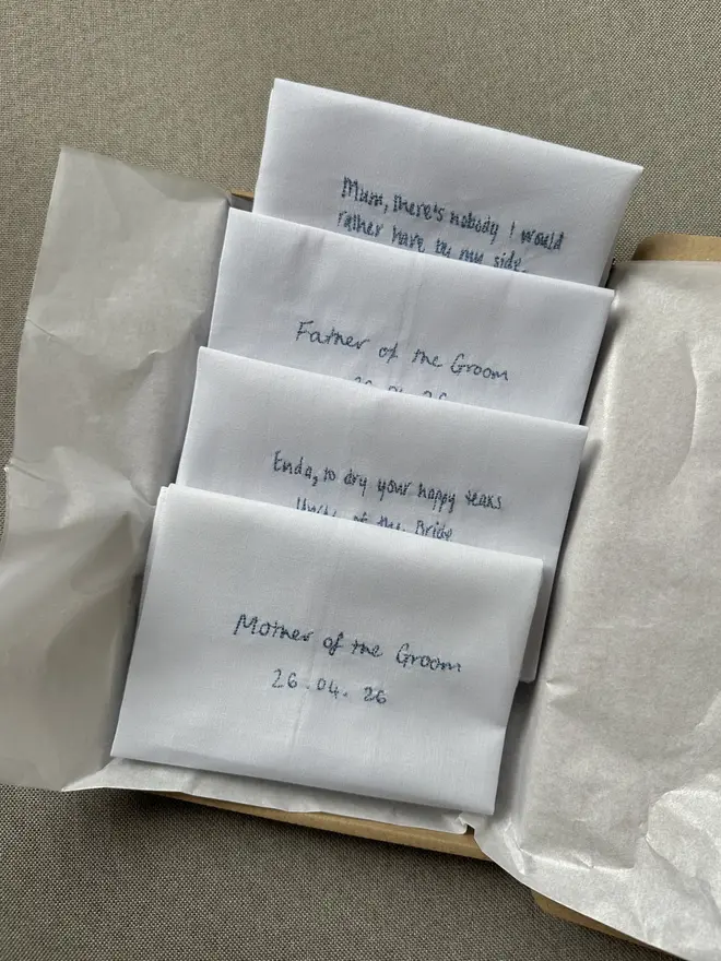handwritten embroidered handkerchiefs in a gift wrapped box