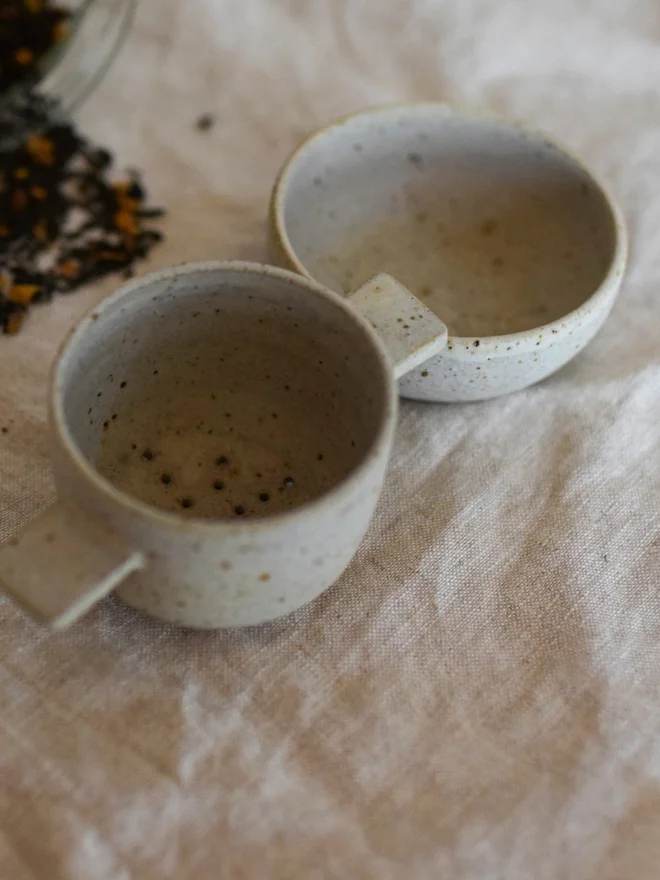 stoneware tea strainer and dish