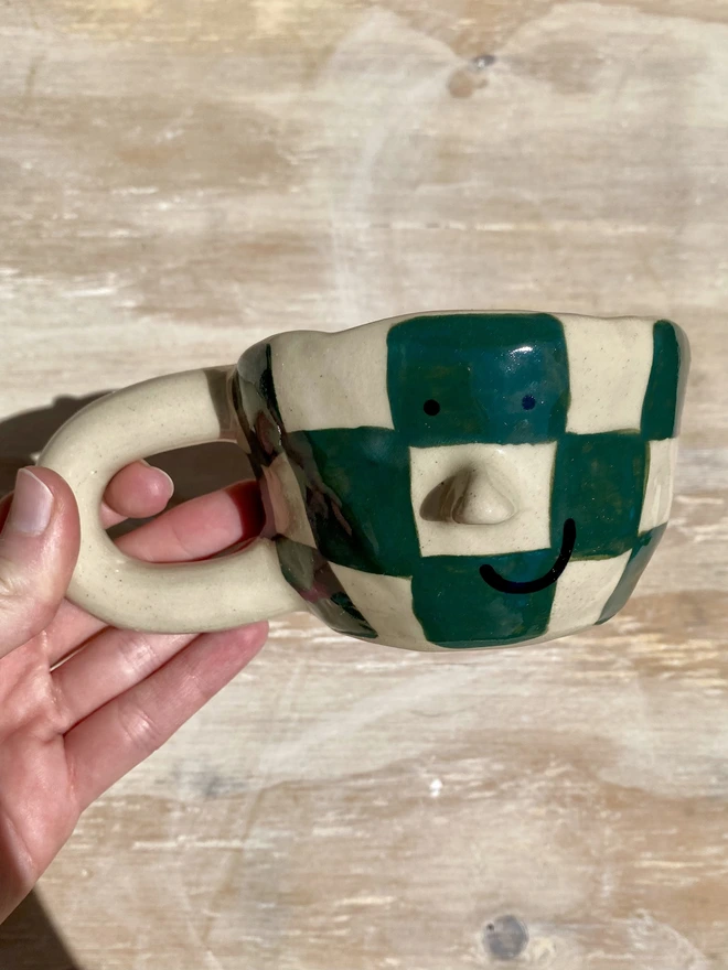 forest checkerboard mug - handle held