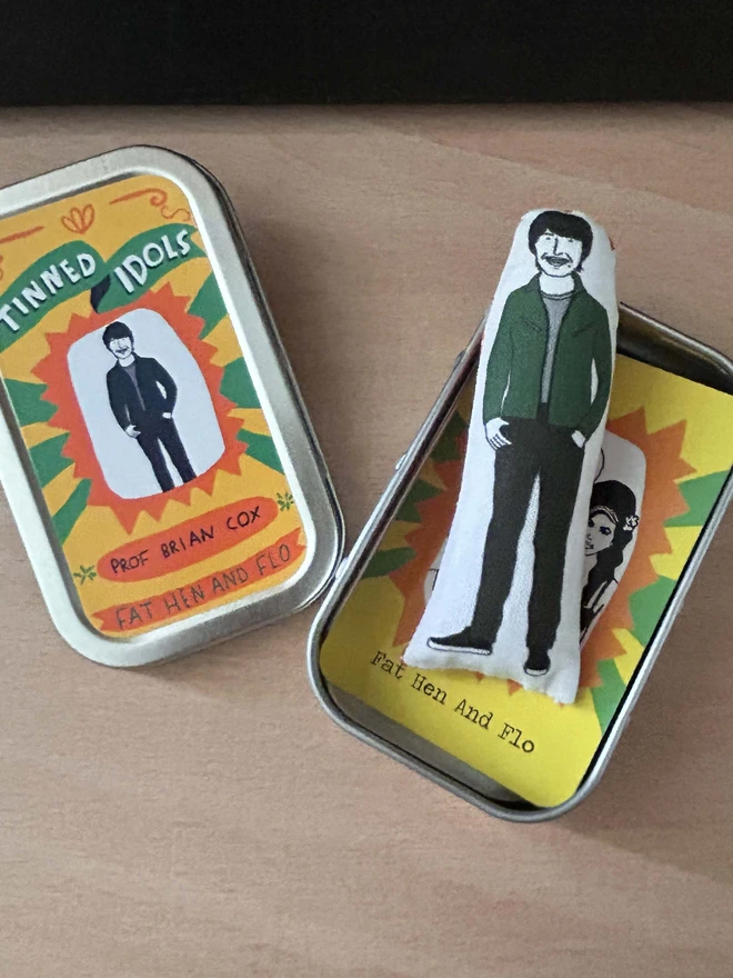 Mini keepsake gift of physicist Professor Brian Cox with tin.