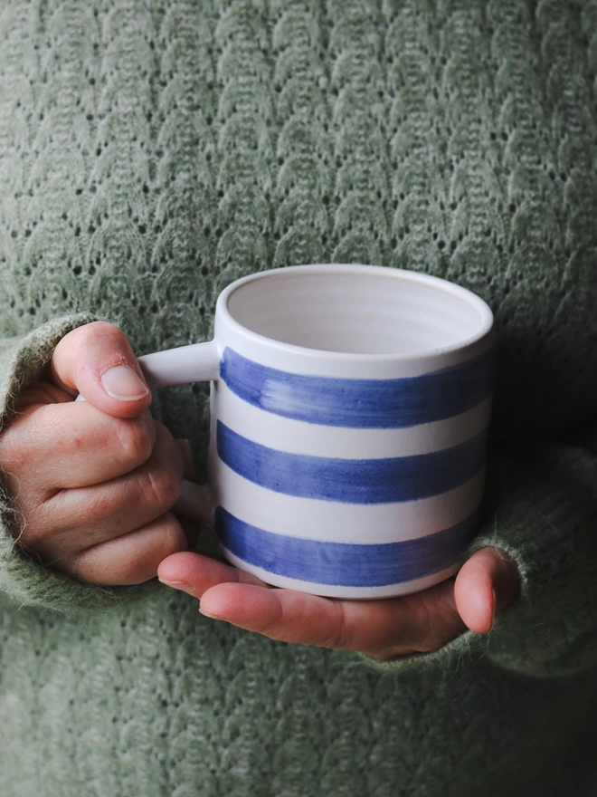 Cornish stripe mug being held