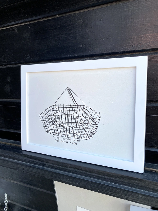 'Vintage Shopping Basket' A4 on Hardboard Framed  by Samantha Barnes