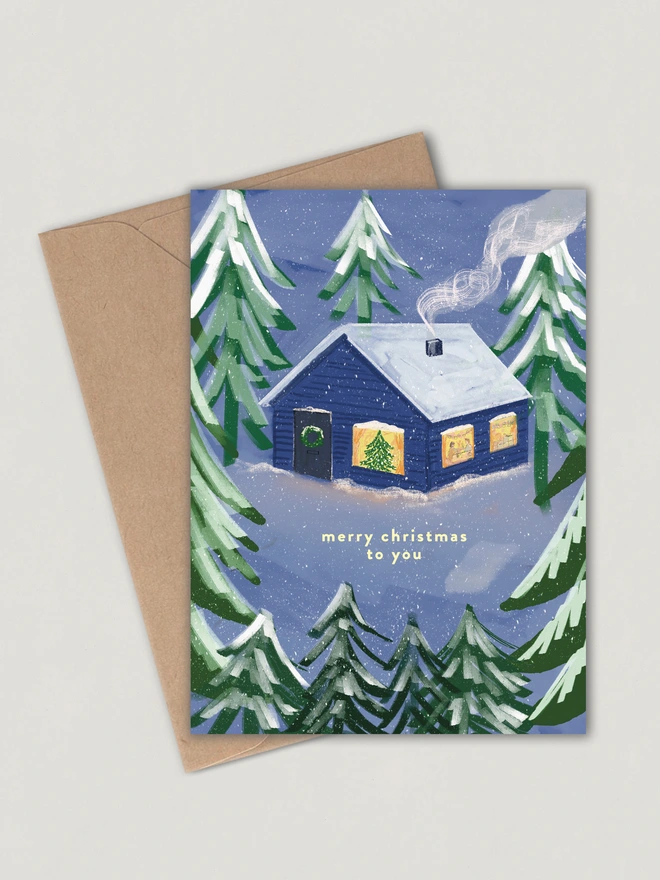 Cosy cabin illustrated Christmas Card