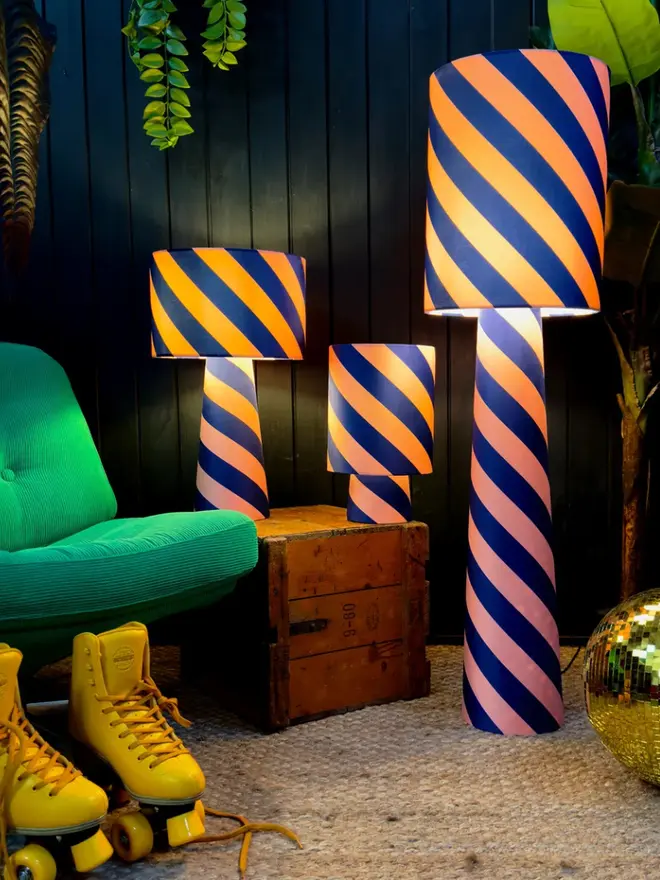 Portable Helter Skelter Velvet Lamps, in a room. 