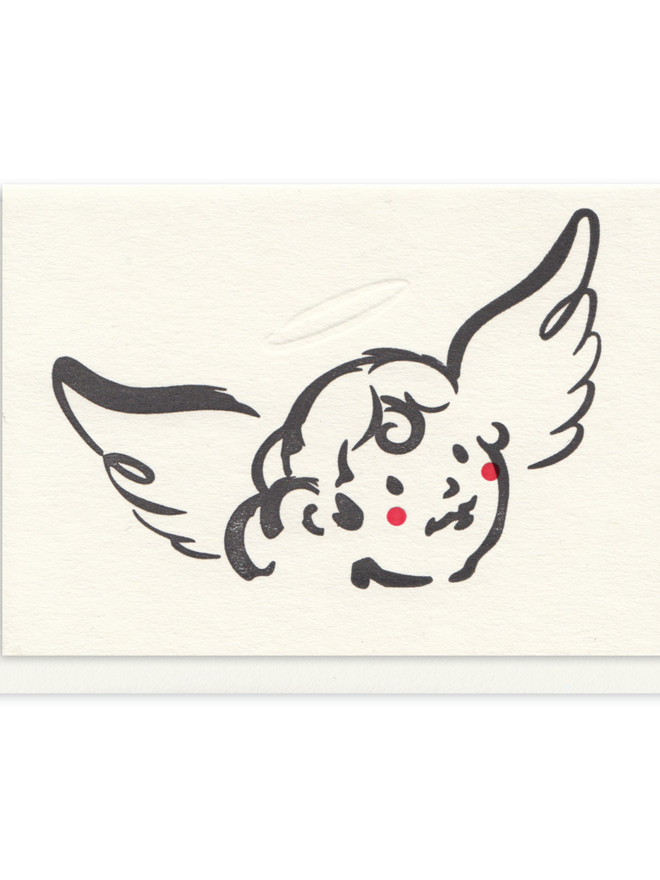 Christmas card with cute cherub illustration in black with red rosy cheeks.  Simple design, letterpress printed.  Black ink on cream paper.