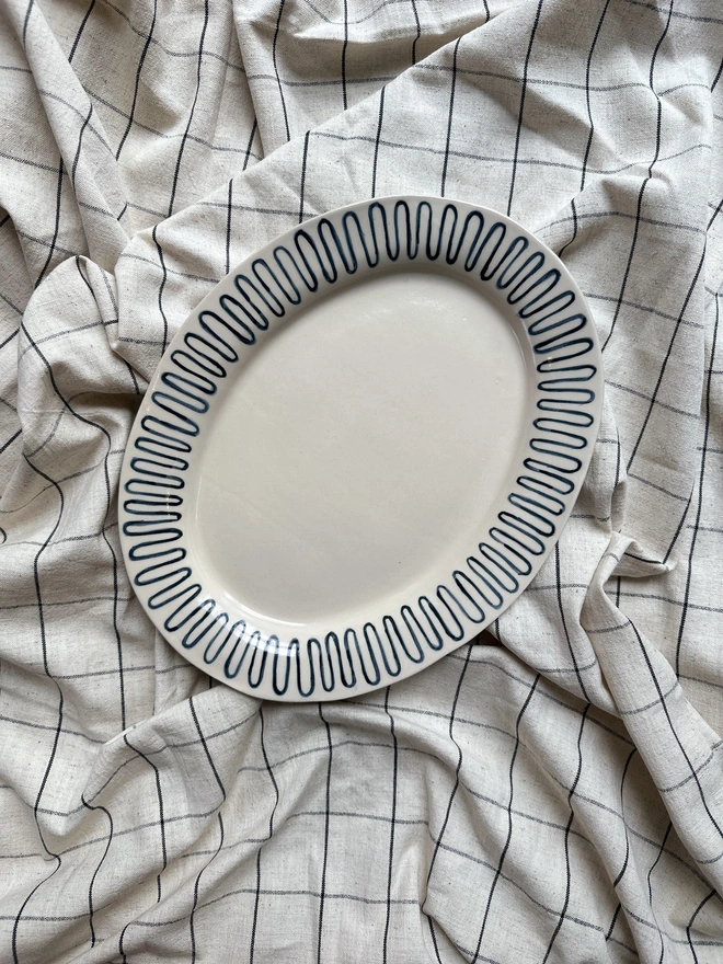 A platter with a decorated rim 