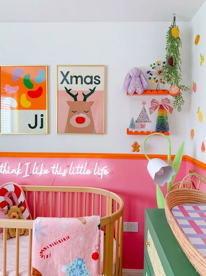 Framed wall prints in a childs nursery