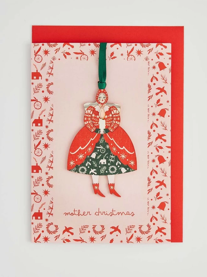 Mother Christmas Decoration on a pink card with a red envelope