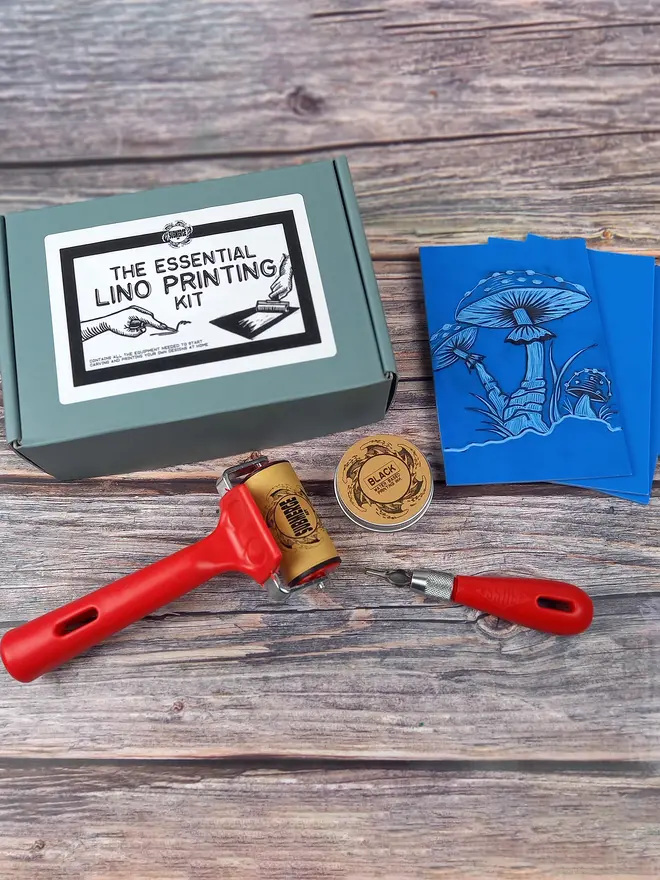 Stamp carving and printing kit with carving tools and sample lino carving