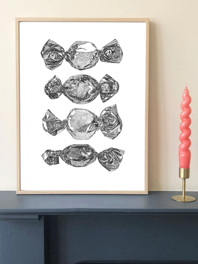 Art print of hand drawn toffees displayed in a frame