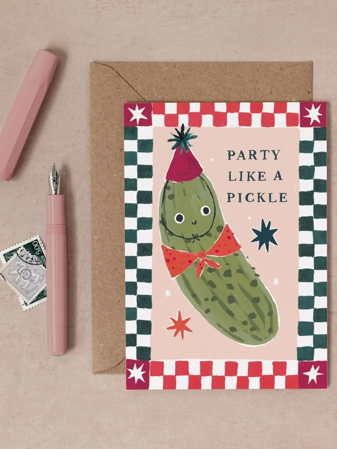 Party Like A Pickle Card with a kraft envelope, funny birthday card with a pickle in a party hat