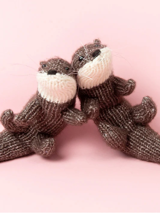 Pair of Otters Knit Kit. A knitted pair of otters.