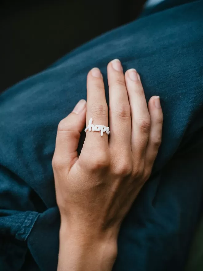 'Hope' Ring in white by Zoe Sherwood. 