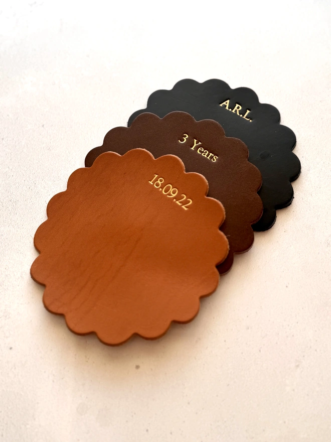 scalloped leather coasters