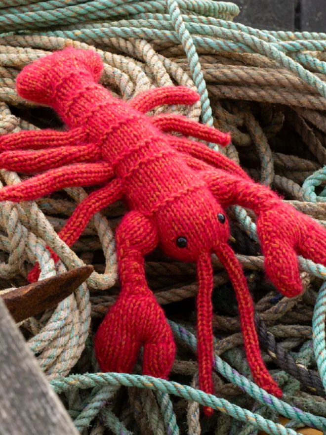 Lobster Knit Kit. A lobster in red.
