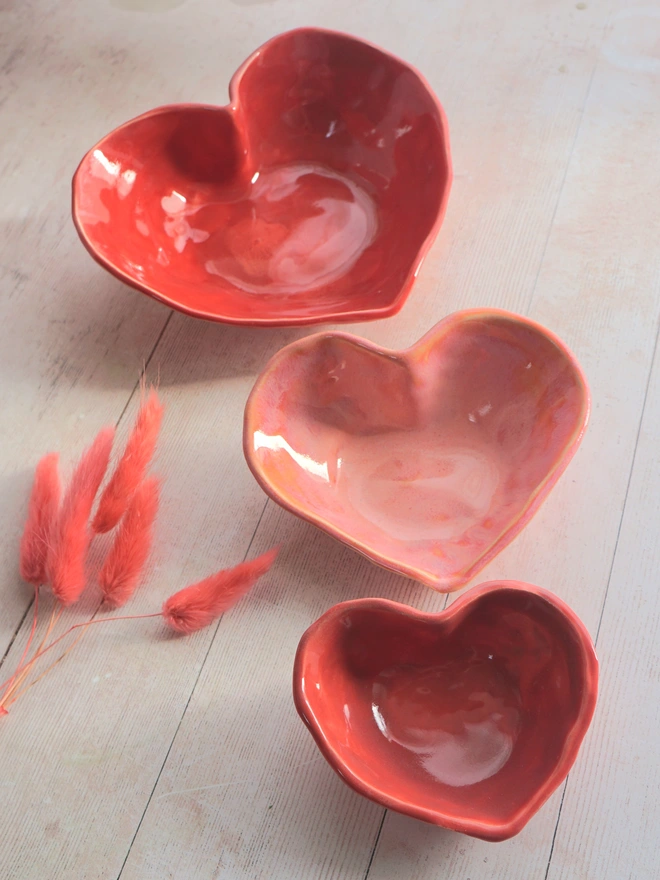heart nesting bowls, pink heart bowls, ceramic heart nesting bowls, ceramic heart bowls, ceramic hearts, Jenny Hopps Pottery, Ceramic heart nesting bowls, Valentine's Day Gifts, heart bowl, pottery bowl, pottery gift set, ceramic gift set, house warming gift, gift for her, gift for wife, gift for friends, gift for partner, love gift, thoughtful gift, handcrafted british pottery, pink bowls, unique tableware, unique homeware, unique gift set, ceramics, pottery, Jenny Hopps