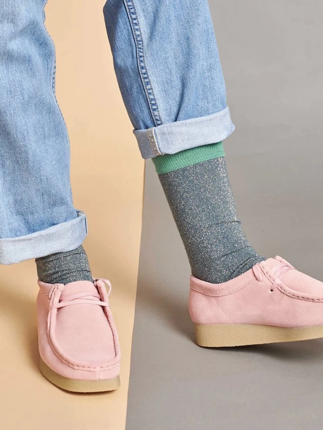 Women's Organic Cotton Ankle Socks Packs (Sets Of 3), a person wearing a pair of colourful patterned socks. 