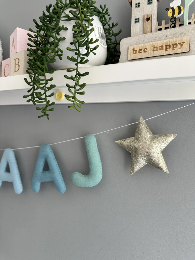 Personalised Name Garland with Stars, a colourful name garland in child’s bedroom, baby gift, nursery decoration, kids bunting 