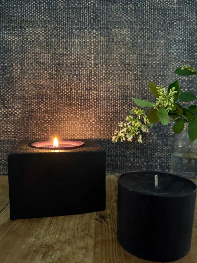 Refillable black candle in yakisugi wood holder