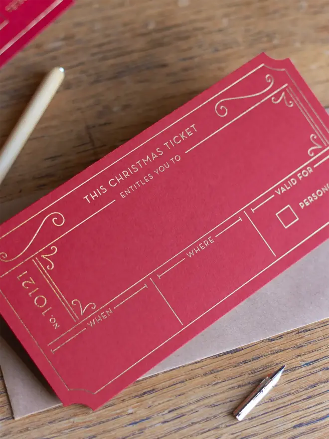 personalised golden voucher for christmas experience gift ticket