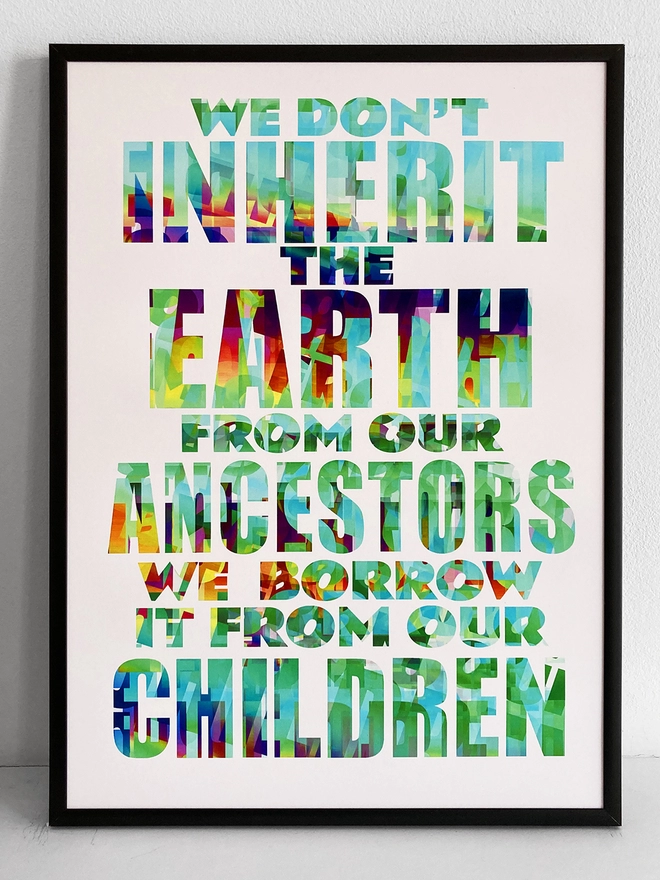 Framed multicoloured typographic print of a Pulp song lyric from Common People - “We don't inherit the earth from our ancestors, we borrow it from our children”.