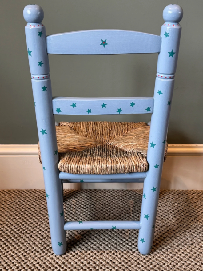 Oscar Hand Painted Chair. A blue chair patterned with darker blue stars.
