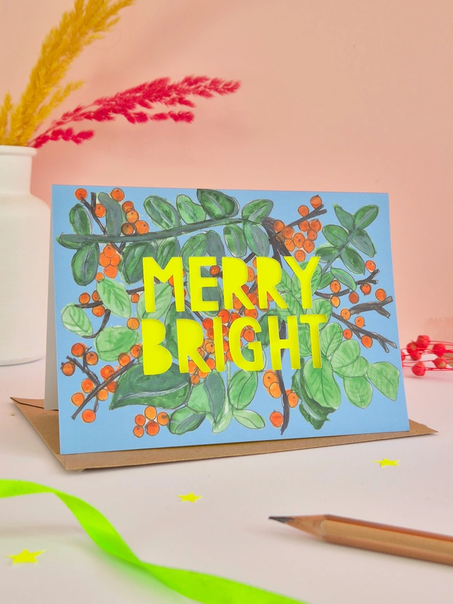 Card four-Orange Illustration with Merry Bright paper cut slogan with neon yellow backing paper 