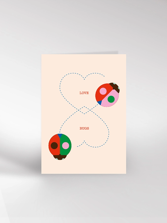 A Valentine's or anniversary card featuring two ladybirds with the words 'Love Bugs'