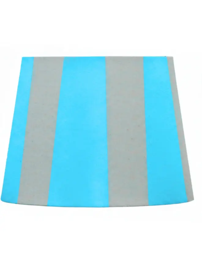 Hand Painted Upcycled Striped Sustainable Drum Lampshade, a neon blue striped lampshade against a white background. 