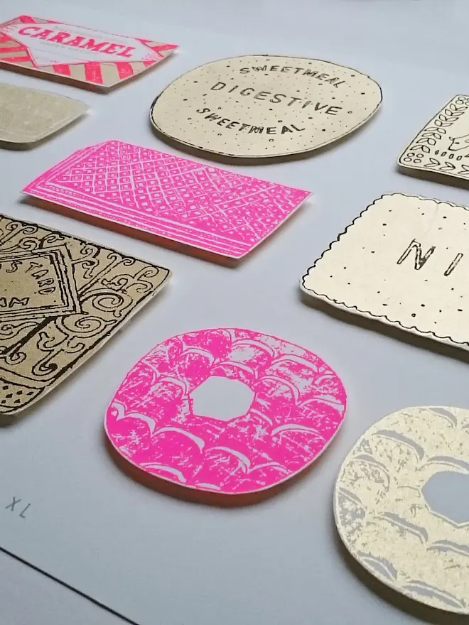 Family Favourites XL A3 Biscuit Screenprint, a collection of colourful biscuit designs on a white screenprint. 