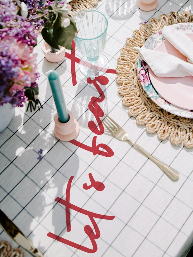 lets feat vinyl text applied to a tablecloth