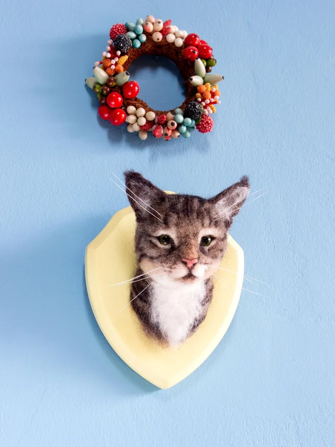 Needle felted, handmade custom cat portrait mounted on a wooden shield. 