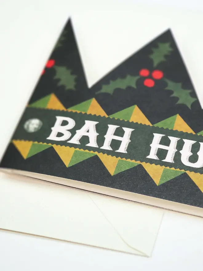 green and red paper crown card with 'bah humbug' text
