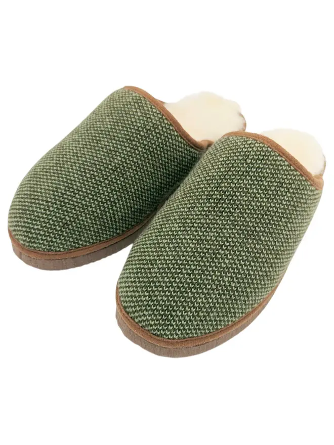 Women's Lambswool & Sheepskin Slippers, a pair of colourful slippers sitting on a white plain surface. 
