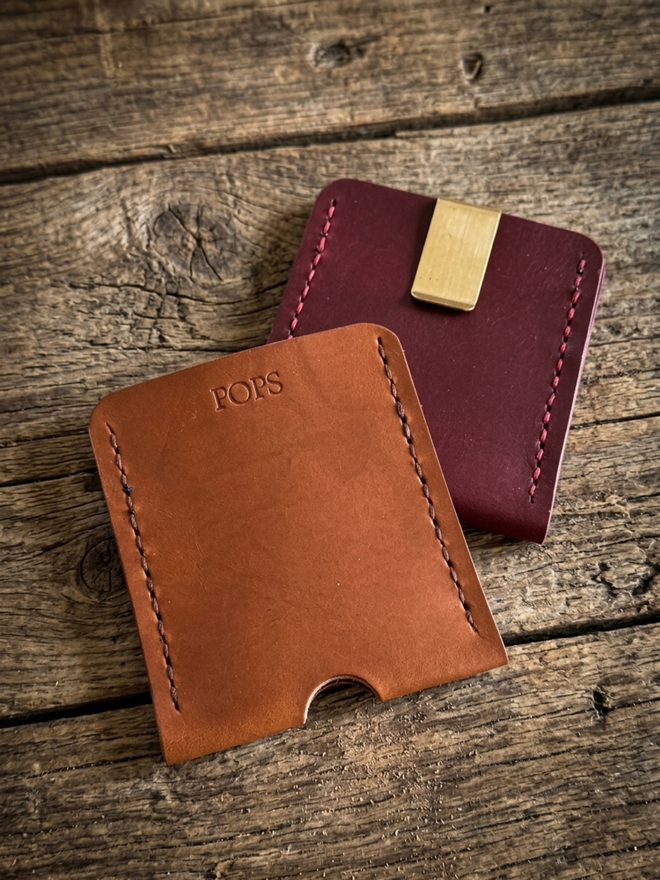 Red and tan simple leather wallet.