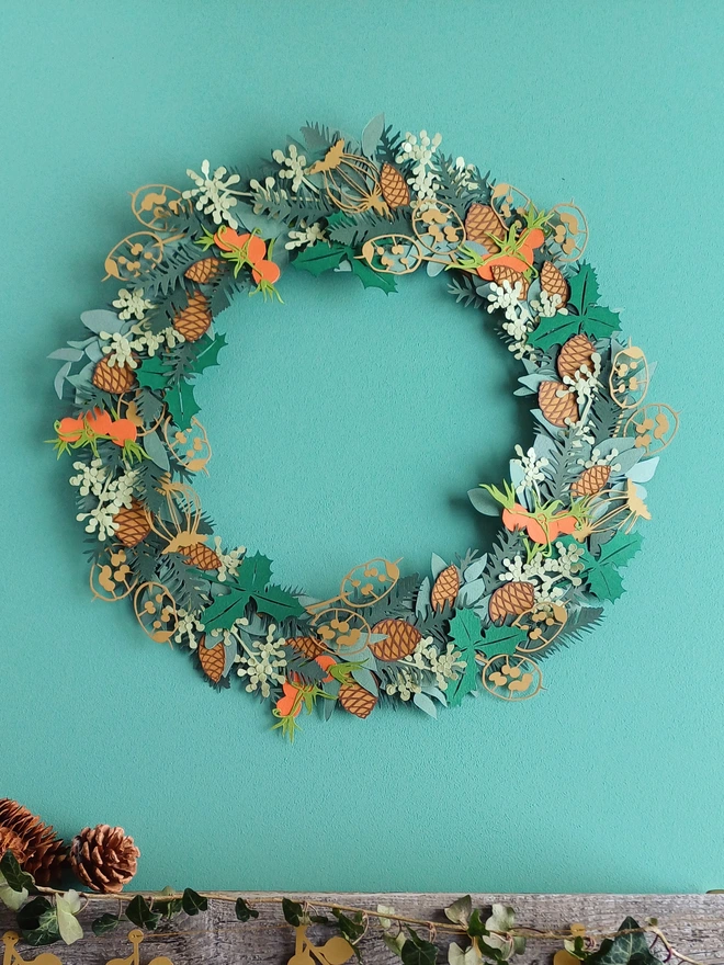 Papercut wreath displayed on wall