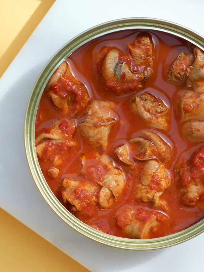 An open tin of Sea Sisters Norfolk Whelks In Kimchi Sauce