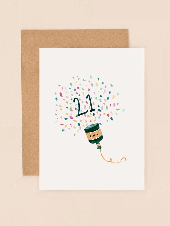 A vibrant illustration of a party popper bursting with colorful confetti, accompanied by the handwritten message "Hooray!" in a playful, cursive font. The design features bright, celebratory colors and a minimalist layout, capturing the joy and excitement of a 21st birthday.
