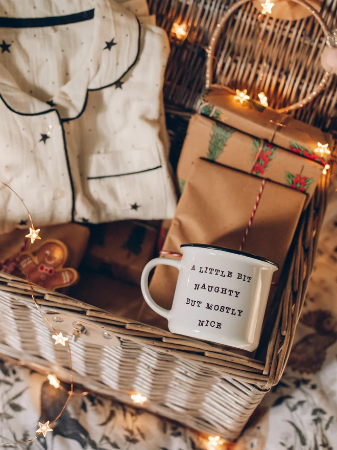 ceramic mug sat in christmas eve basket