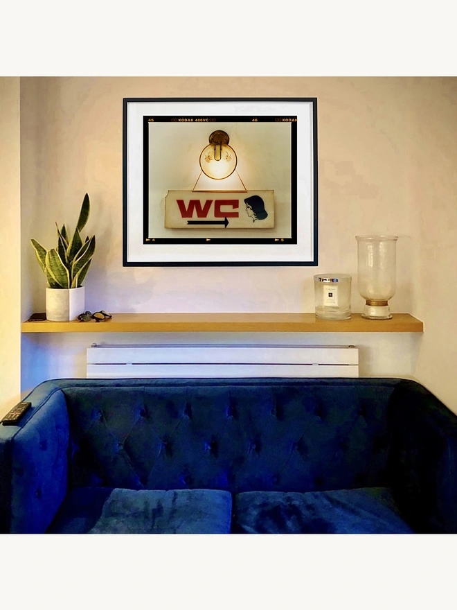 WC sign photograph framed in black in situ