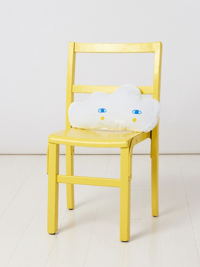 Cloud cushion on chair