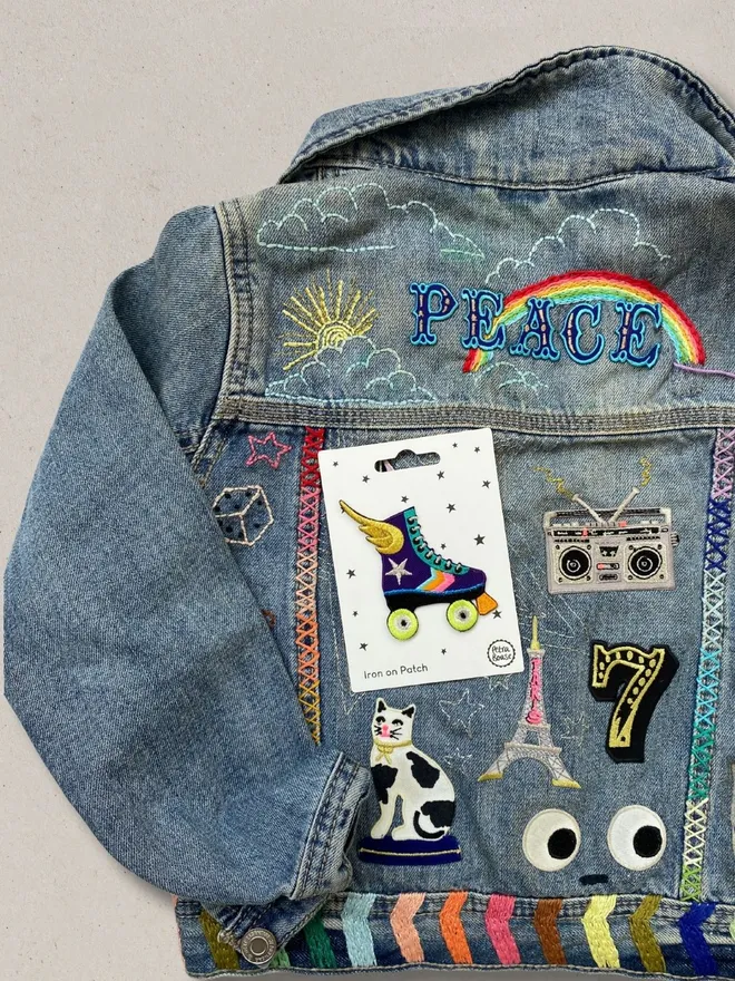 Rollerskate embroidered iron on fabric patch on a customised denim jacket.