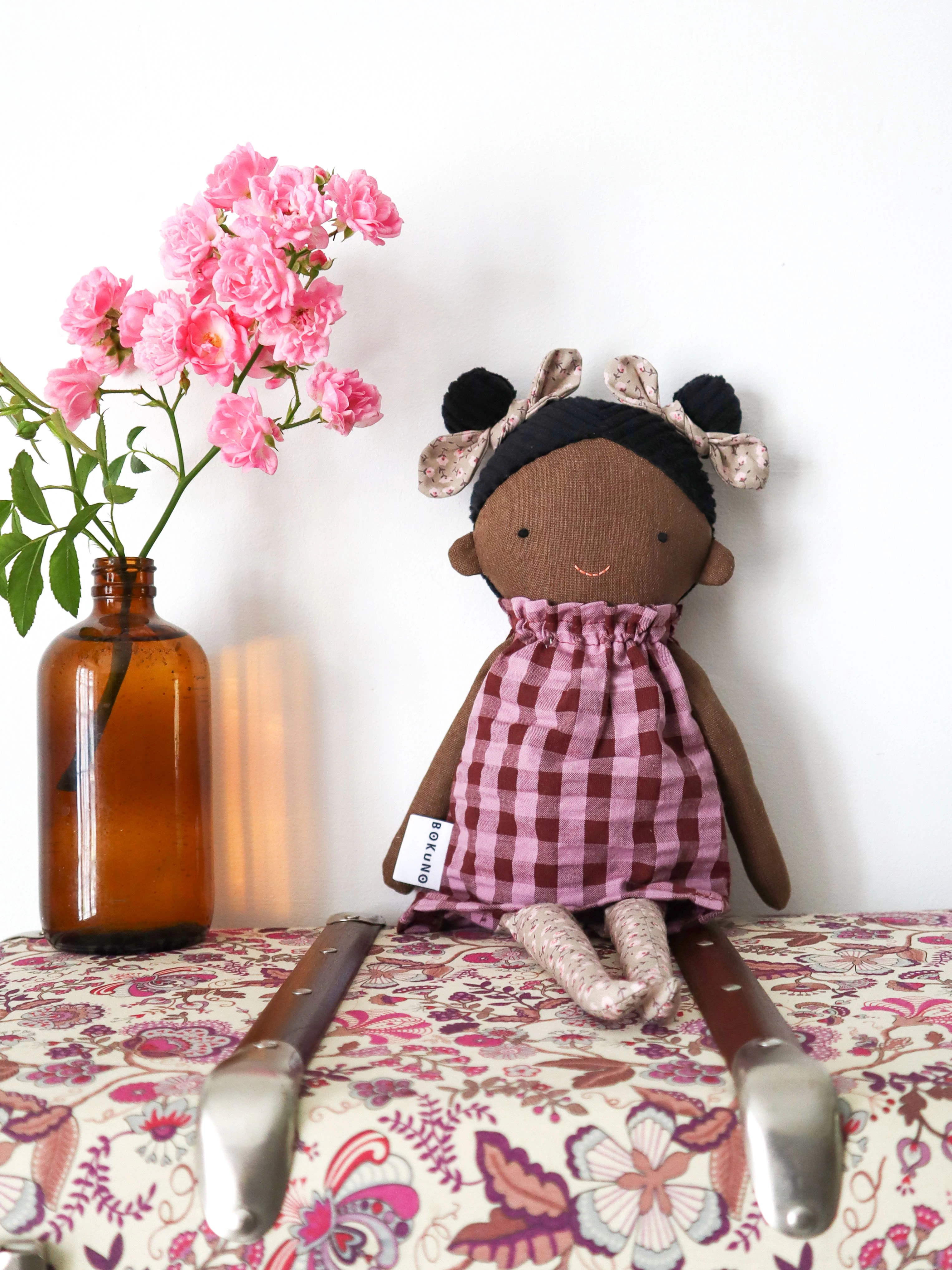 black girl doll with braided black hair twin knot 