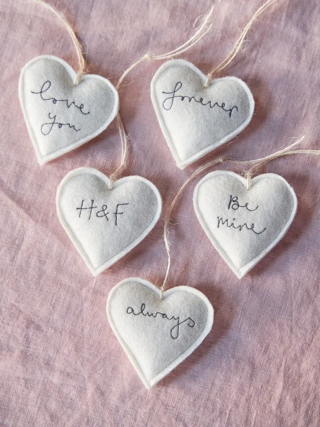 Personalised felt heart embroidered hanging decoration.
