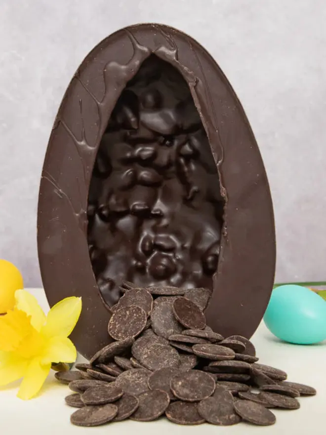Dark chocolate and ginger easter egg with buttons coming out of it