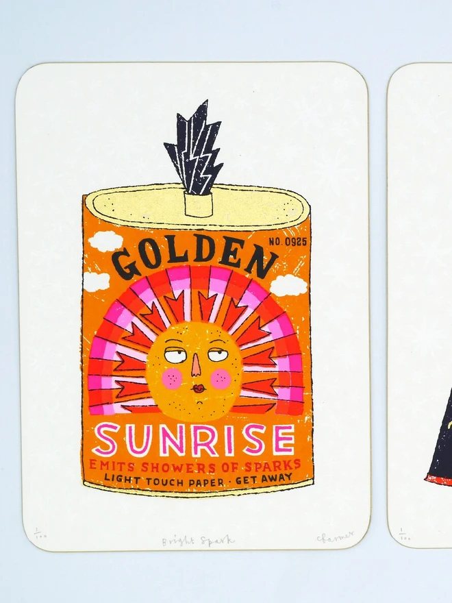 Bright Spark Sun Firework Screenprint, a colourful firework tin design on a white screenprint against a baby blue backdrop. 