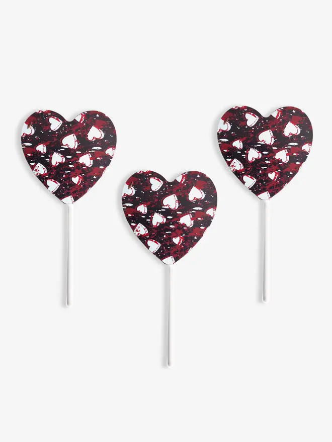 Three dark chocolate heart-shaped lollipops for Valentine's Day