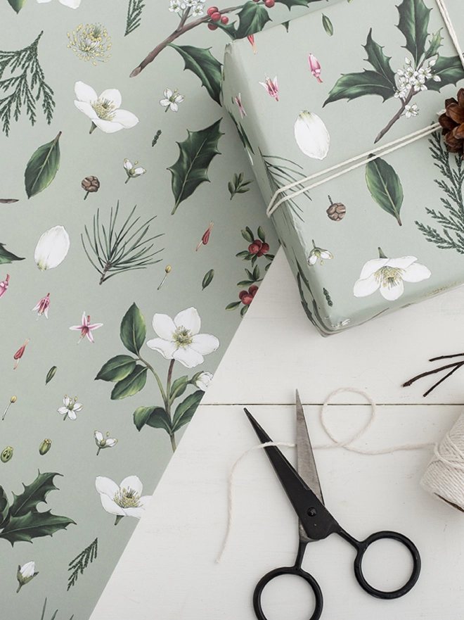 Green based Christmas wrap with festive elements pattern